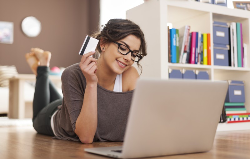 girl with credit card for online shopping