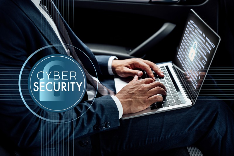 cyber security professional with a laptop